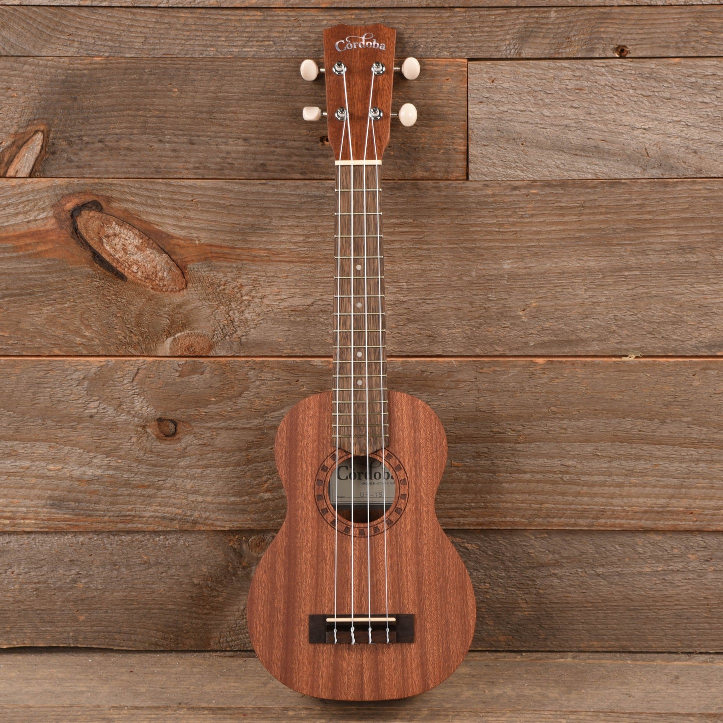 Cordoba Soprano Ukulele Mahogany Player Pack w/Travel Bag, Clip-On Tuner, Strings, and Chord Book Folk Instruments / Ukuleles
