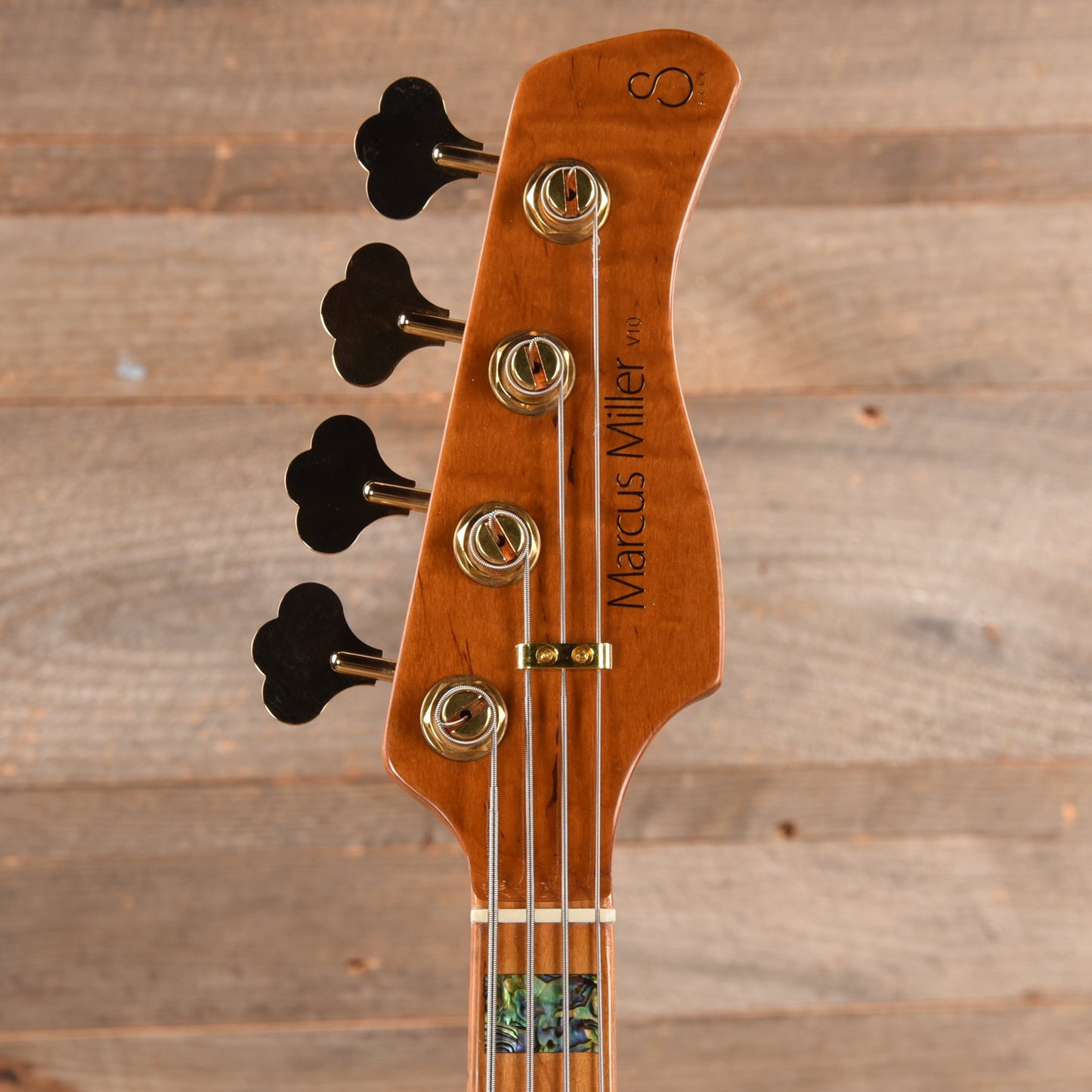 Sire Marcus Miller V10 DX Flame Maple/Swamp Ash 4-String Tobacco Sunburst