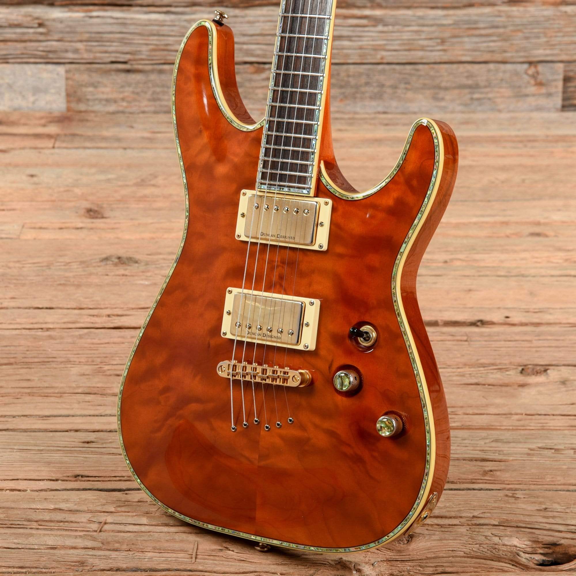 Schecter C-1 Elite Honeyburst 2002 – Chicago Music Exchange